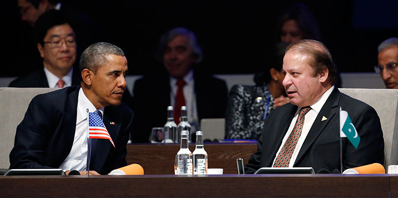 Enlarged view: U.S. President Barack Obama listens to Pakistan's Prime Minister Nawaz Sharif (R) during the opening session of the Nuclear Security Summit in The Hague March 24, 2014. (Reuters/Yves Herman/Files)